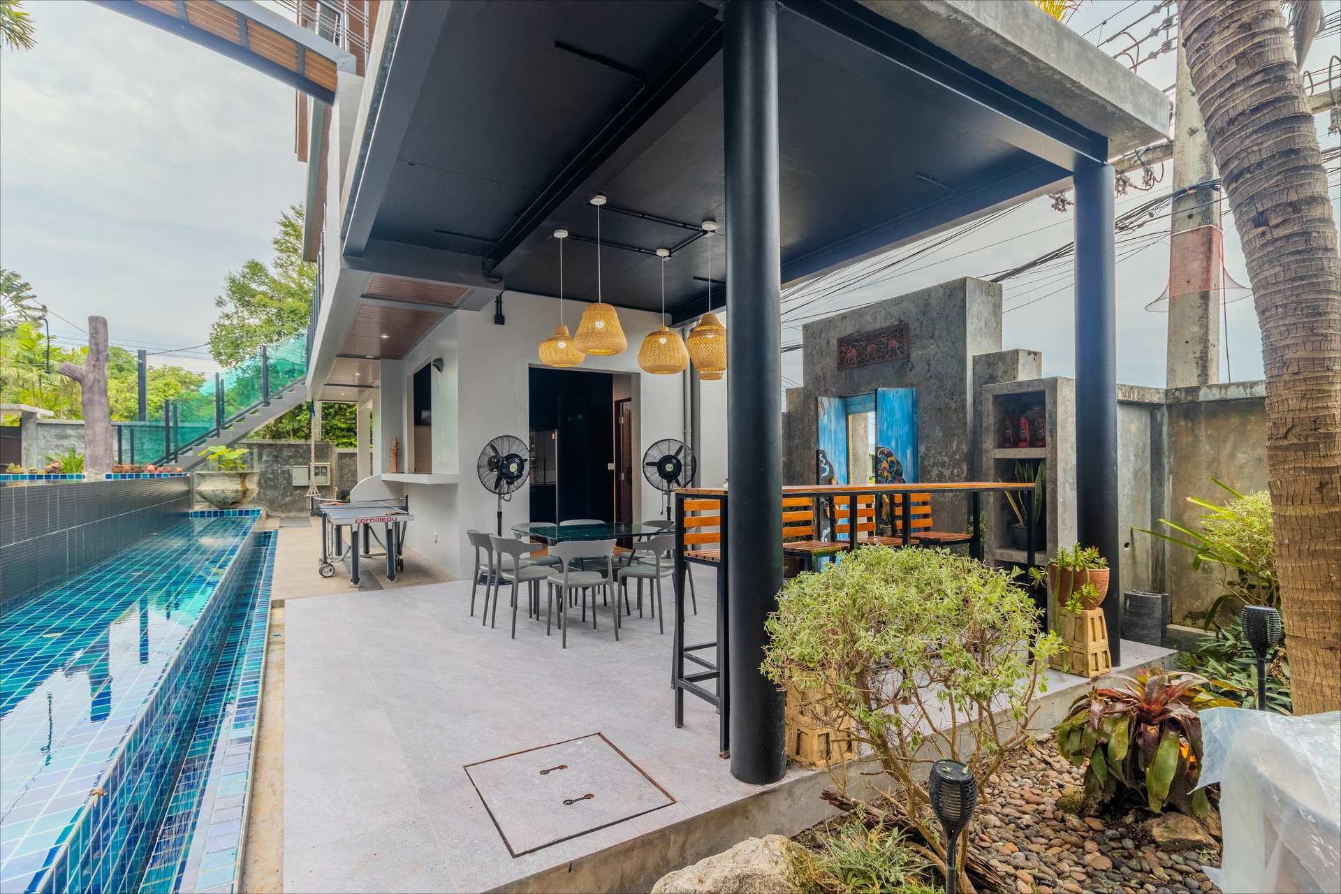 BBQ area with tropical garden backdrop